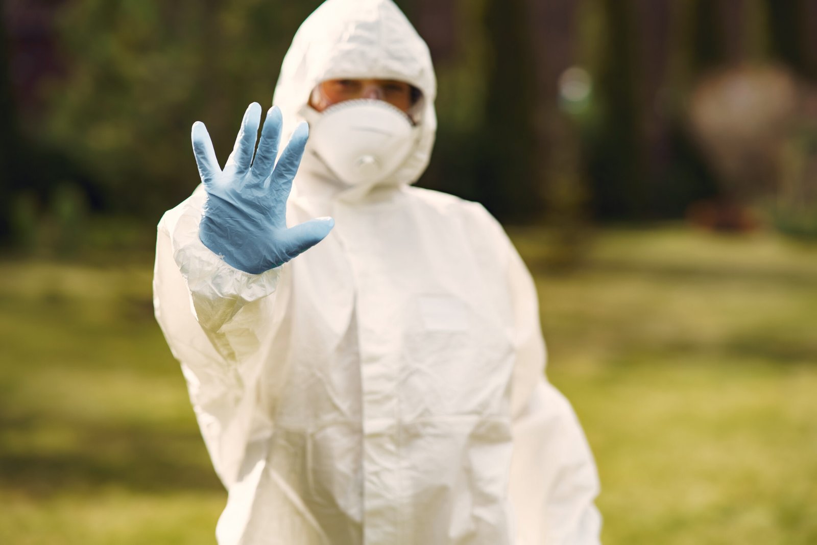 Person in a protective suit in a park Comprehensive Protection Plan
