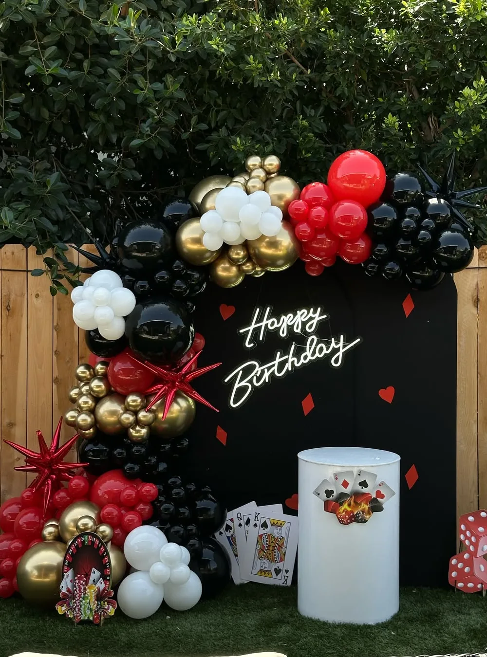 Elegant Outdoor Casino-Themed Photo Backdrop