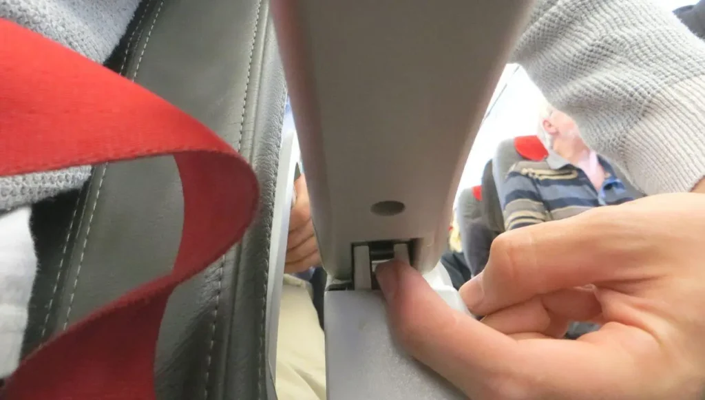 Find the Hidden Armrest Button