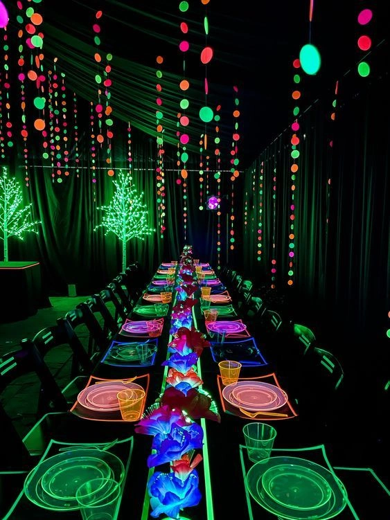 Neon Party Table Setting with Hanging Decorations