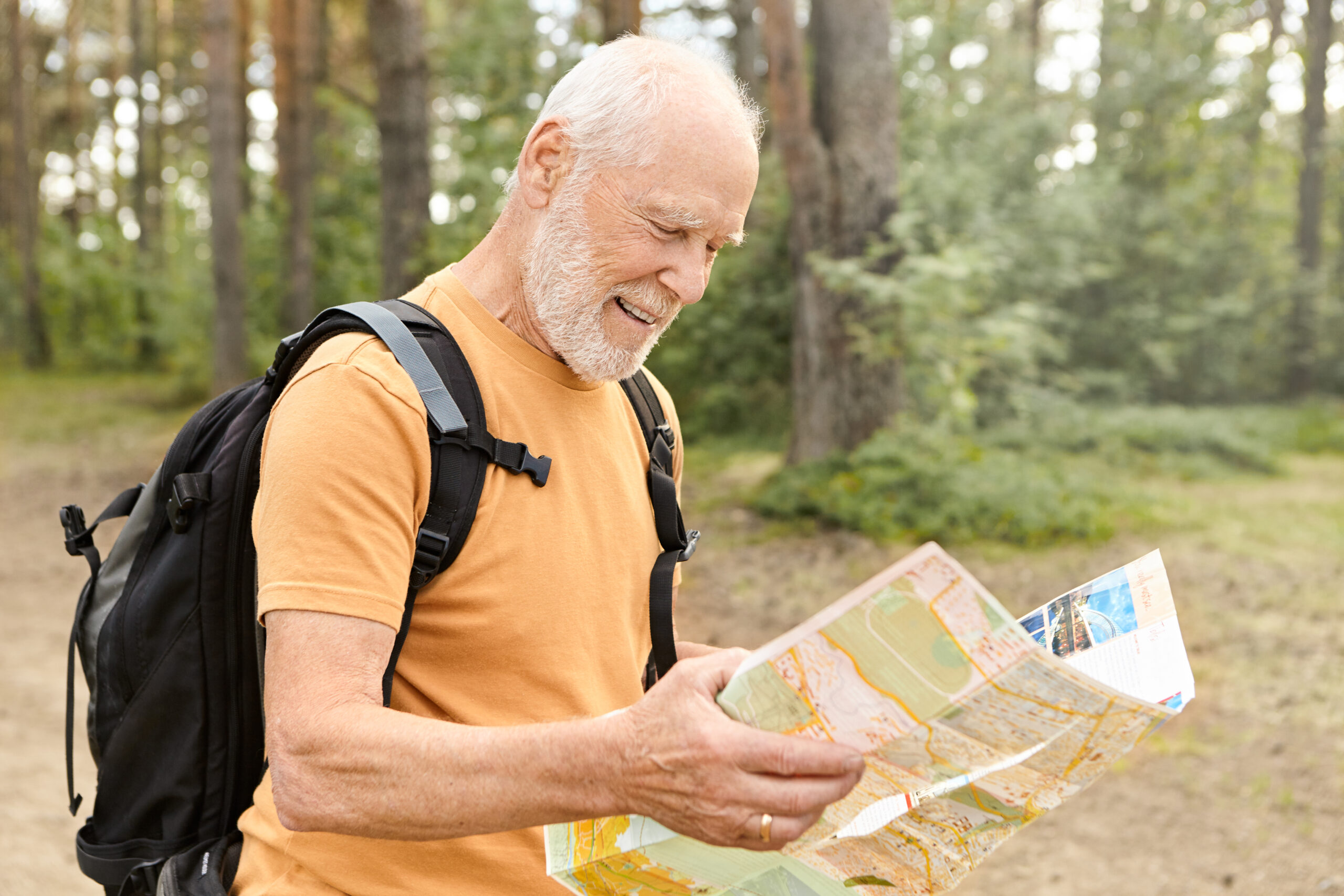 Summertime image of cheerful handsome energetic mature male pens Pick Two Base Locations for Your First Year