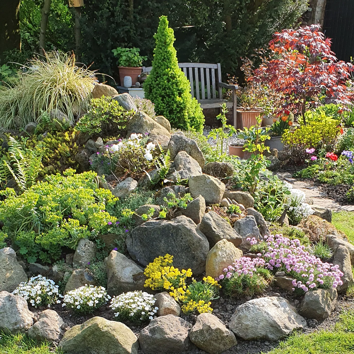 Sloped Boulder And Bench Retreat