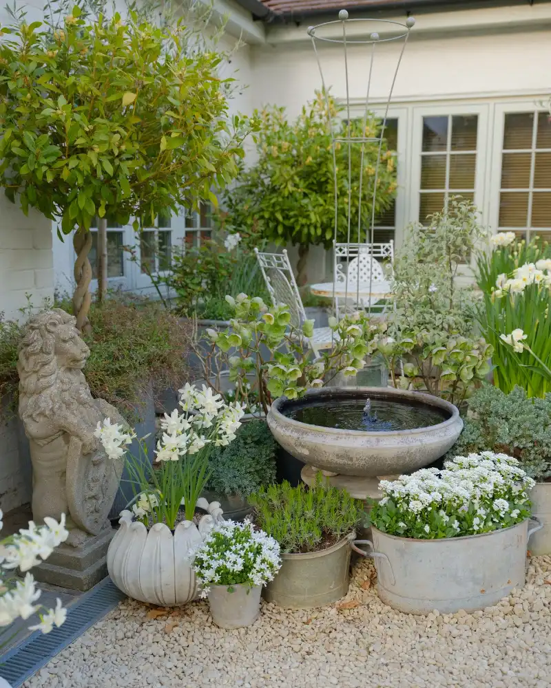 Statement Fountain Corner With Container Plantings