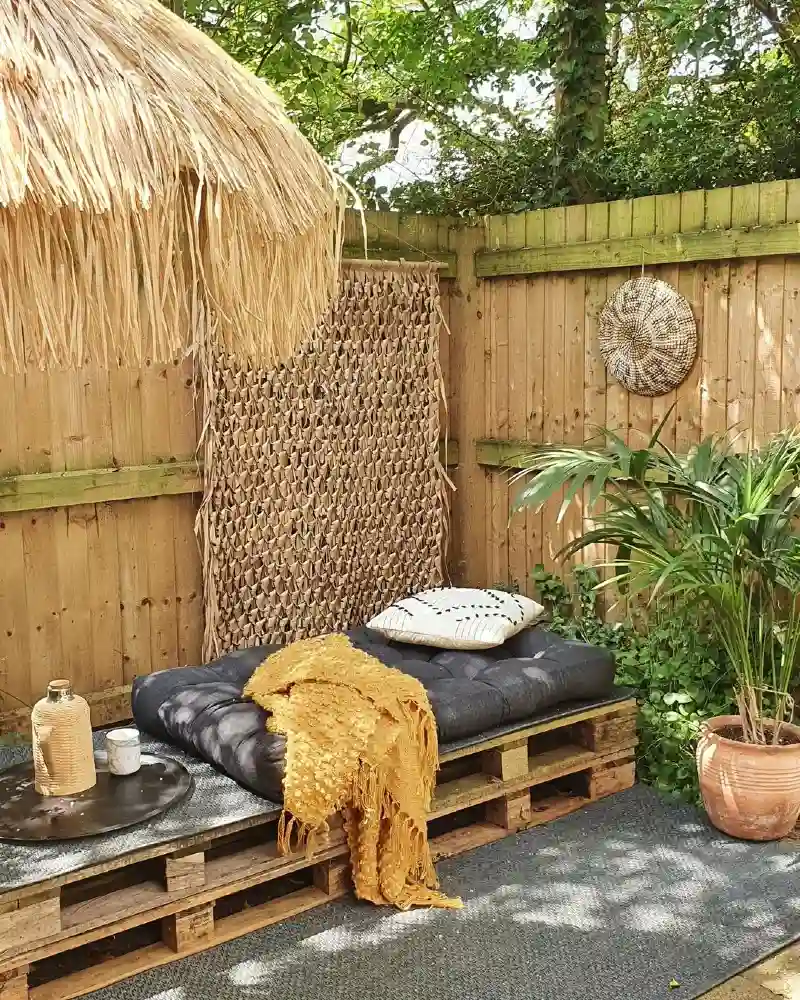 Thatched Canopy Nook With A Pallet Daybed