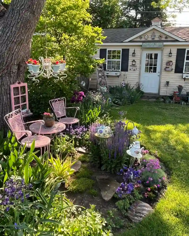 Whimsical Pink Seating Beside A Garden Shed