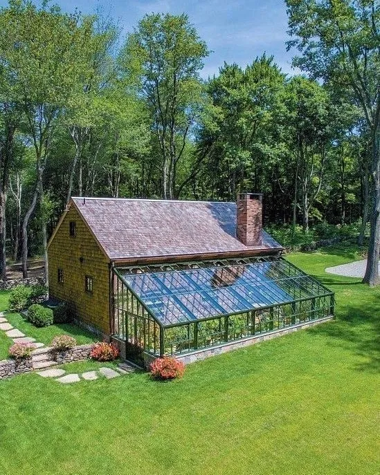 Wood-Framed Greenhouse with Character