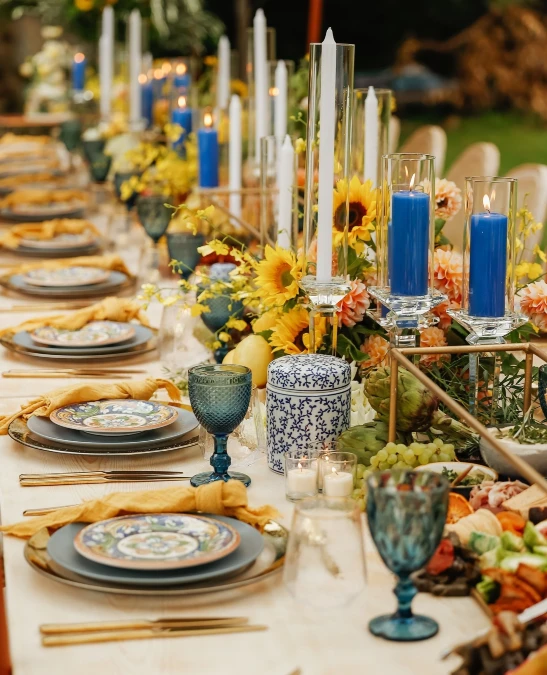 Sunflower and Blue Candle Dining